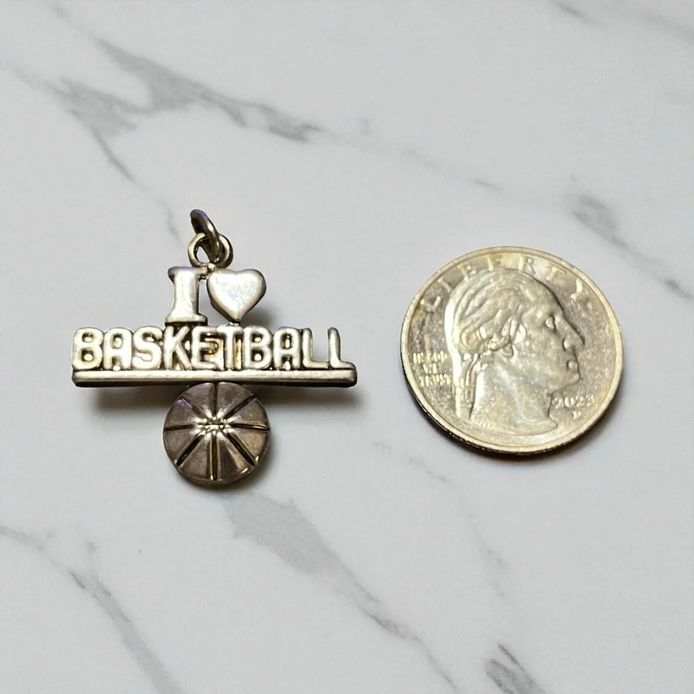 Silver Basketball Pendant Signed “Best”
